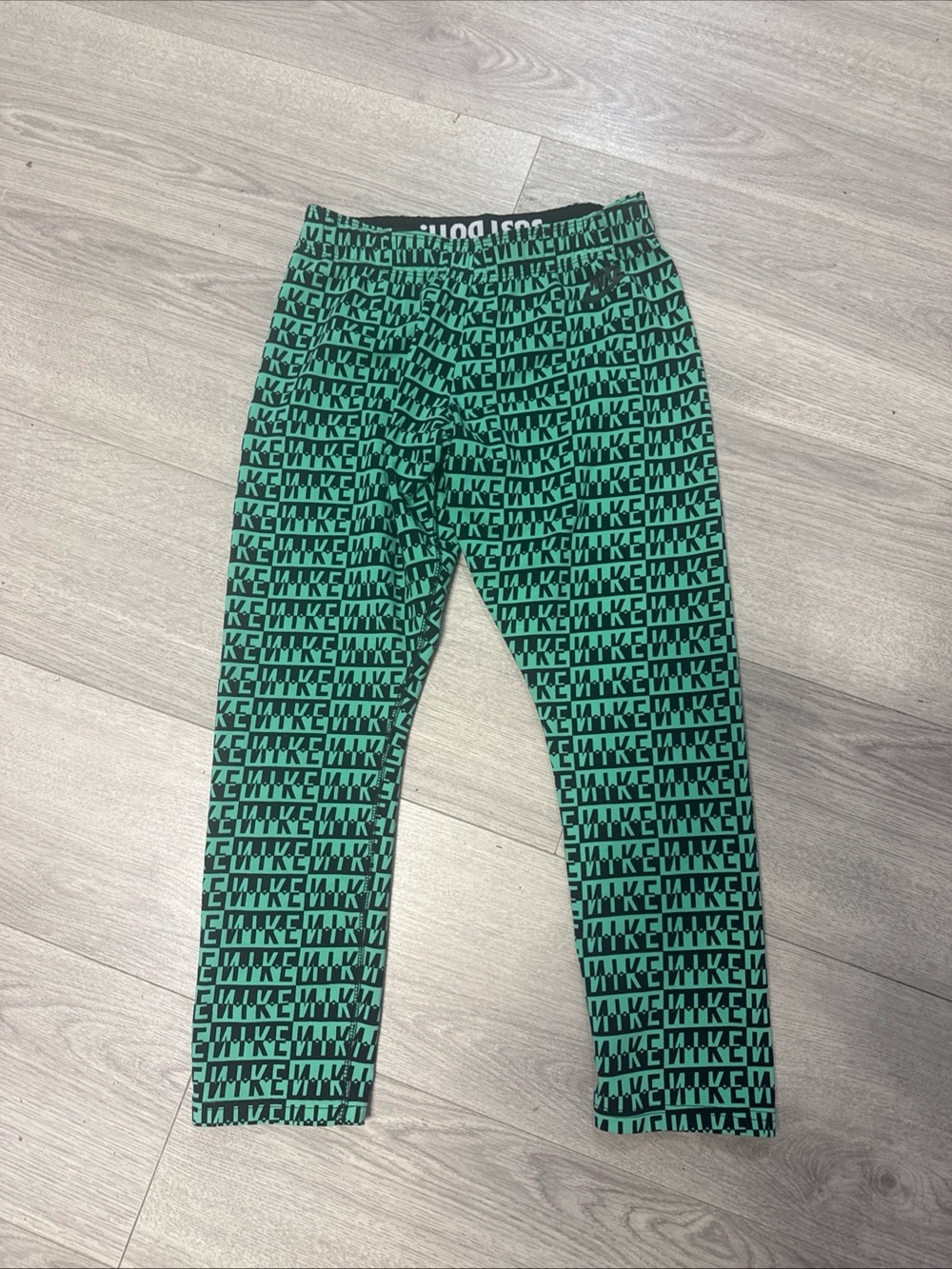 Nike Athletic Workout Green and Black Nike pattern Logo Leggings